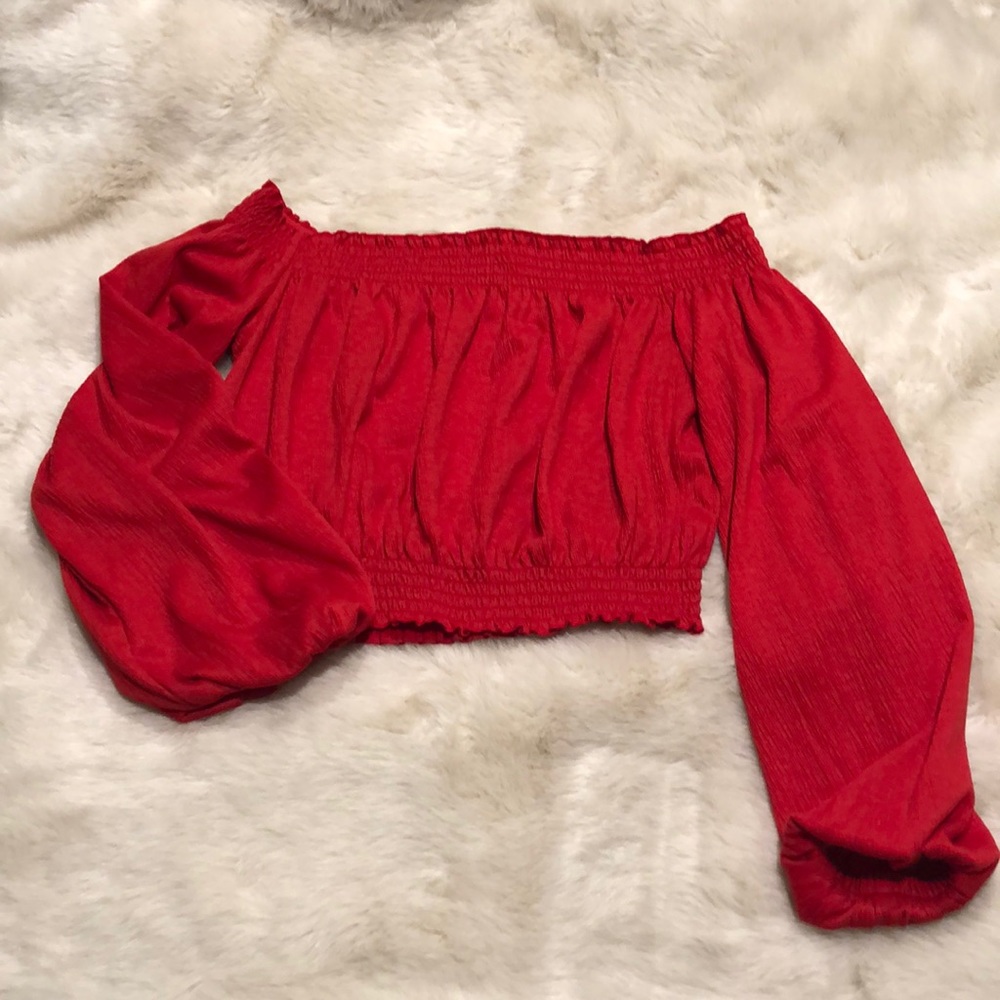 Red off the shoulder shirt